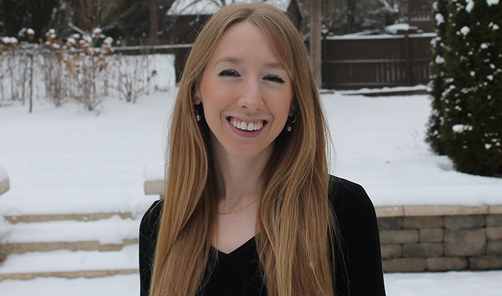 Headshot of Amanda Hodes with a snowy background.