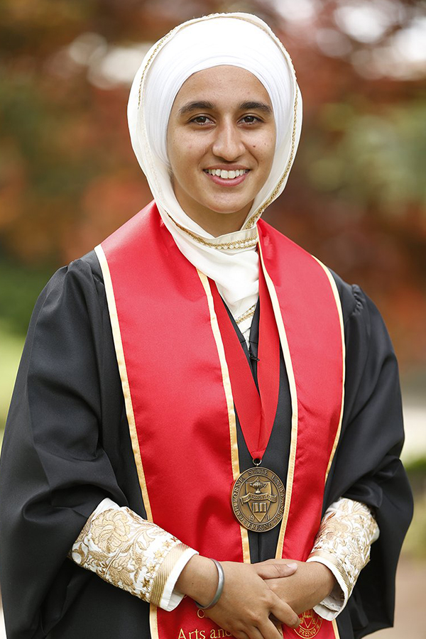 portrait of peekay gill in cap and gown