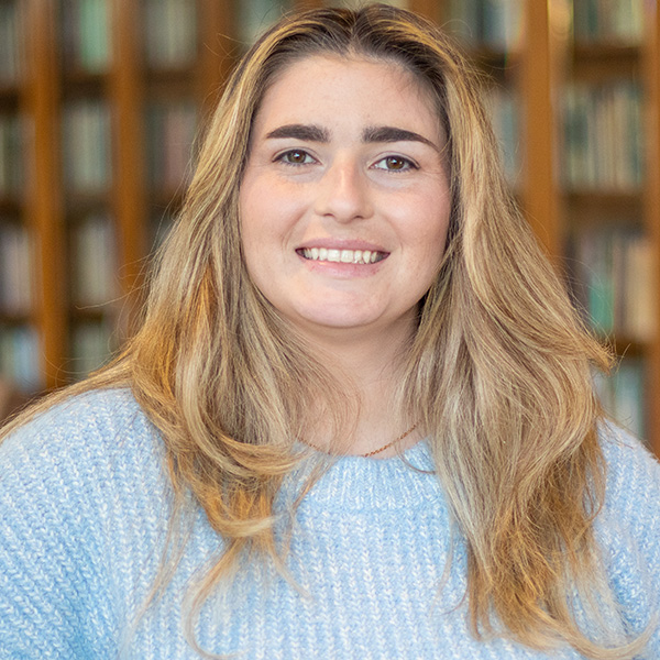 Headshot of Shannon inside the library.