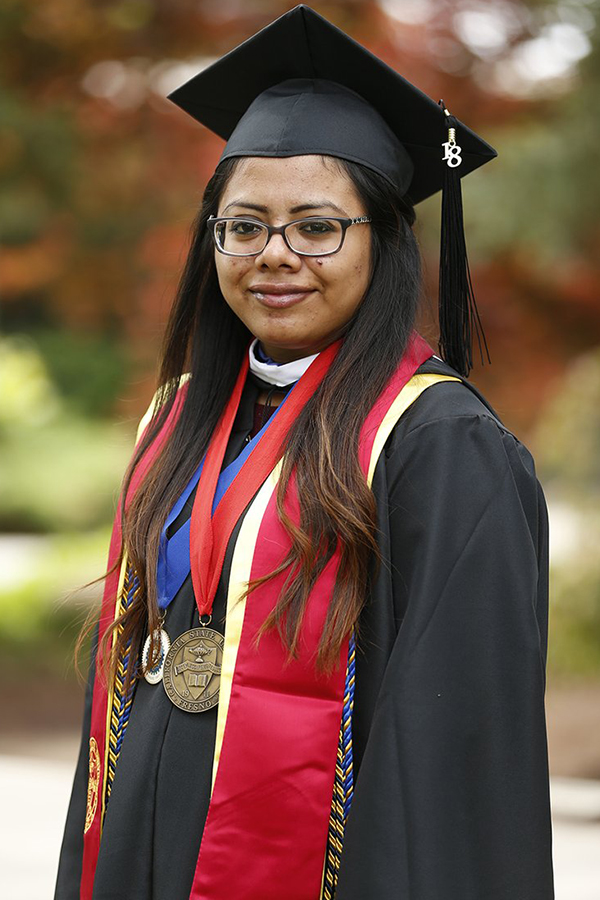 portrait of lupe remigio ortega in cap and gown