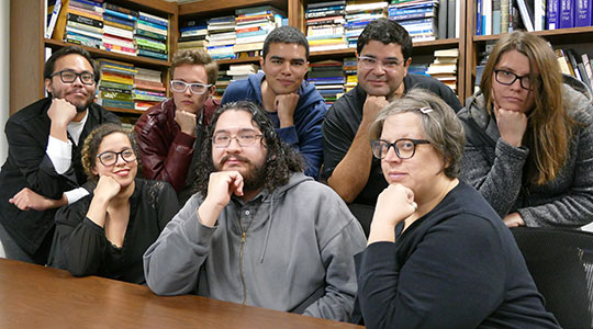 Philosophy students in the "thinking man" pose