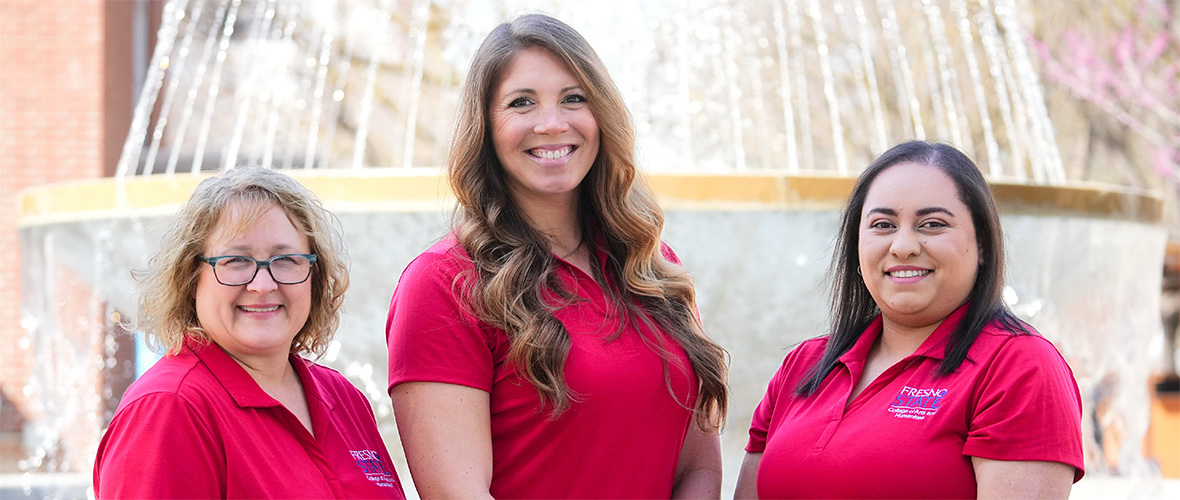 Krista Hall, Nadia Dwidar, and Sarah Pantoya in red Fresno State shirts.