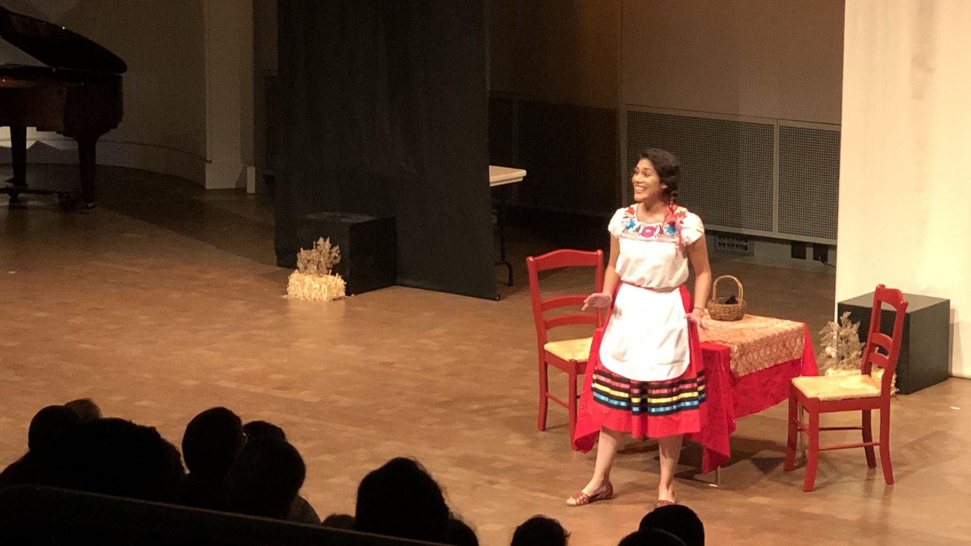 Alejandra Tejeda performs the part of Lucinda in the Lucinda y las Flores de la Nochebuena at an elementary school
