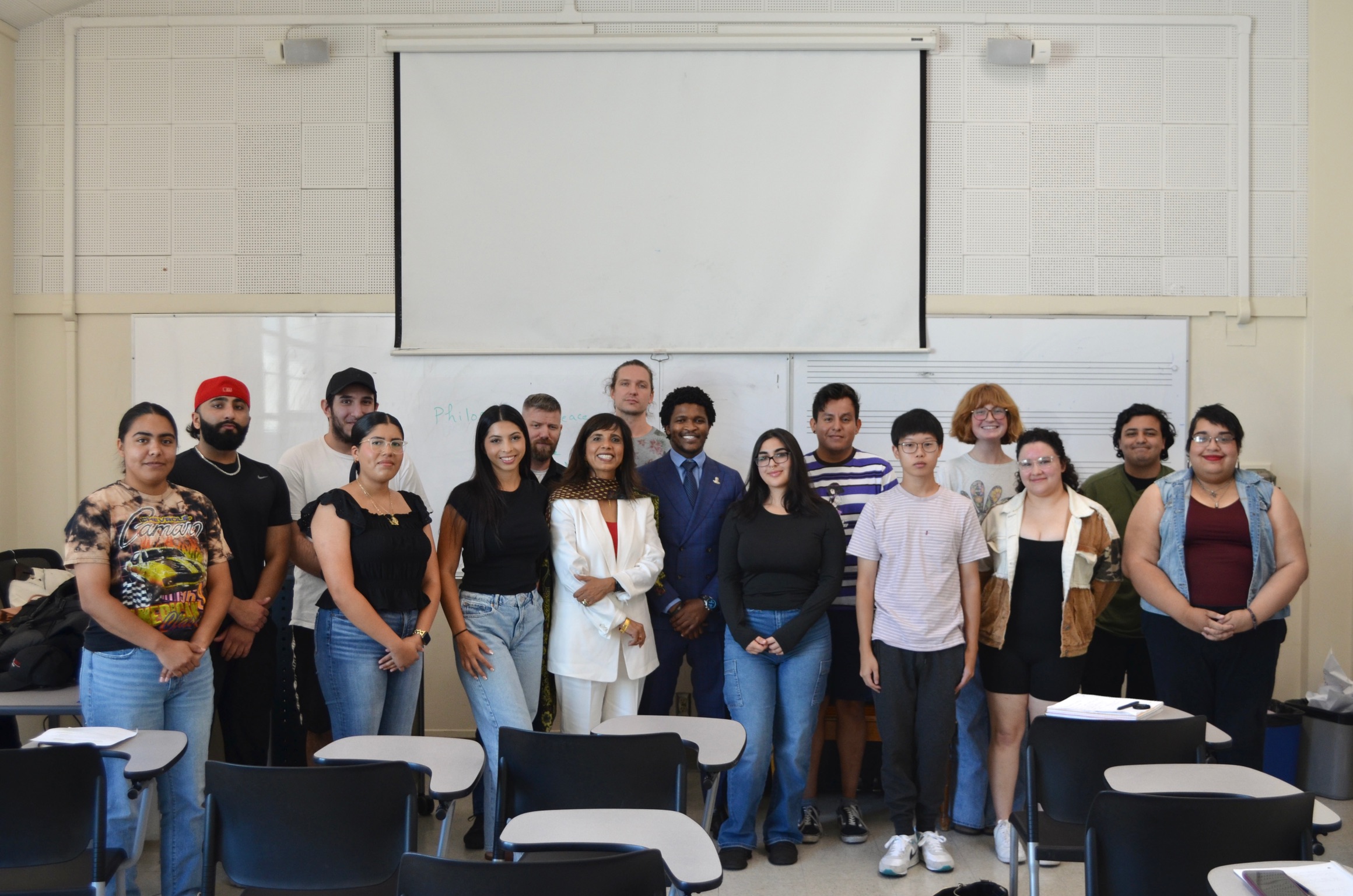 Dr. Howard with others at AUM event