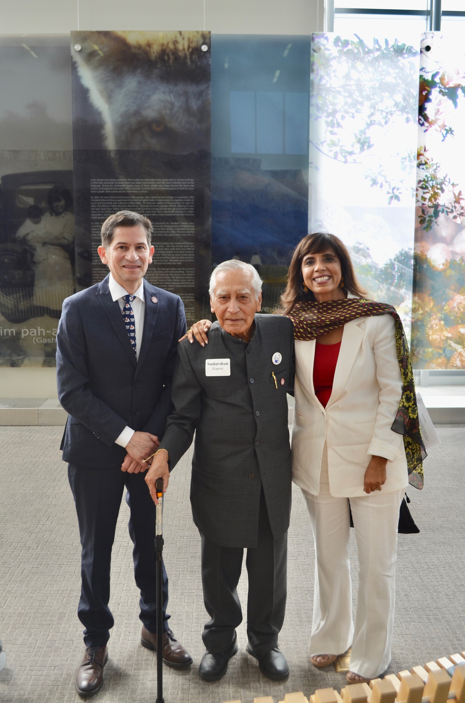 Dr. Howard with others at AUM event