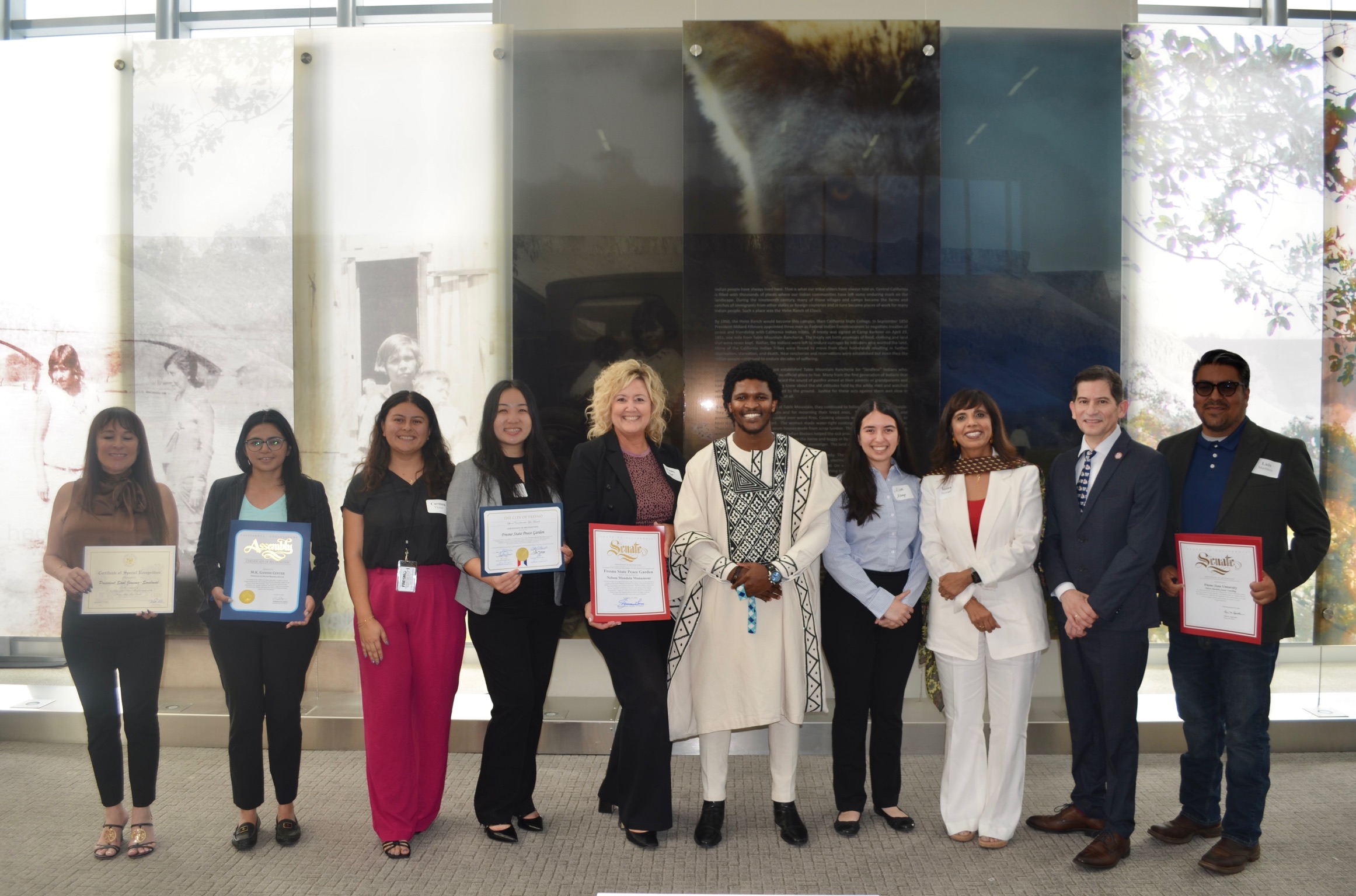 Dr. Howard with others at AUM event