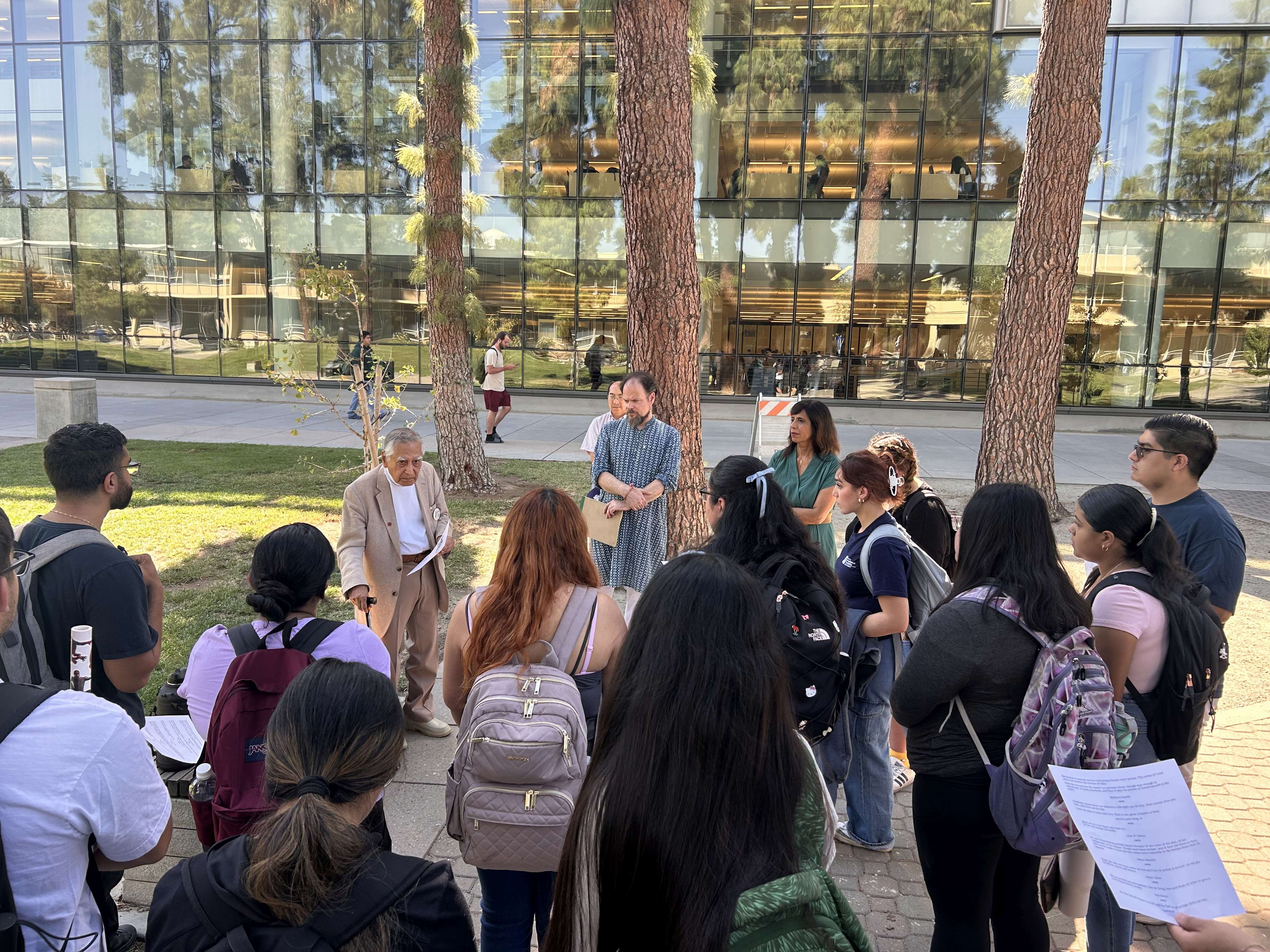 Dr. Kapoor, Prof. Howard, and Prof. Rosenhagen with students in the Peace Garden