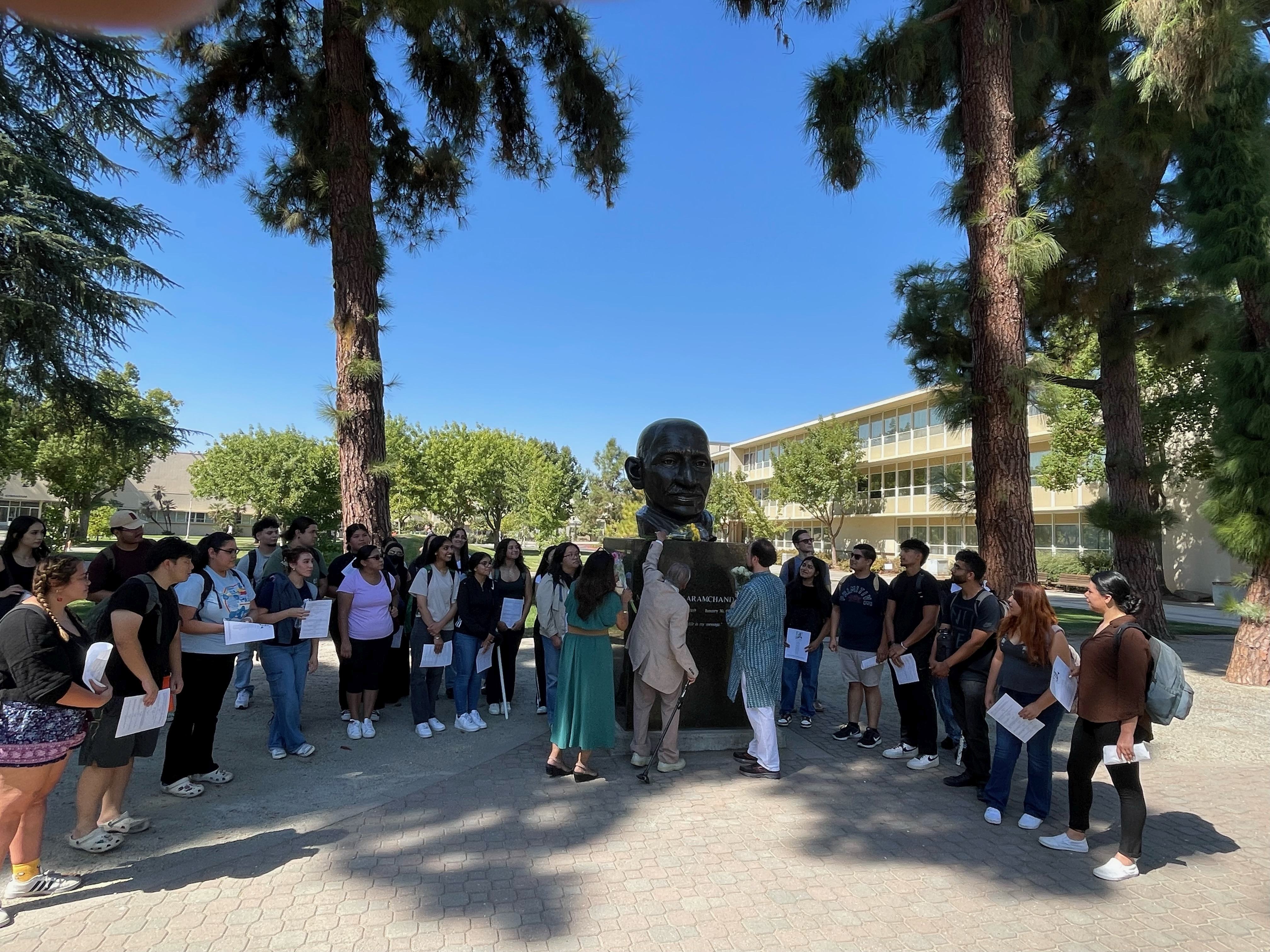 Prof. Howard, Rosenhagen, & Kapoor and students at the Gandhi monument -1