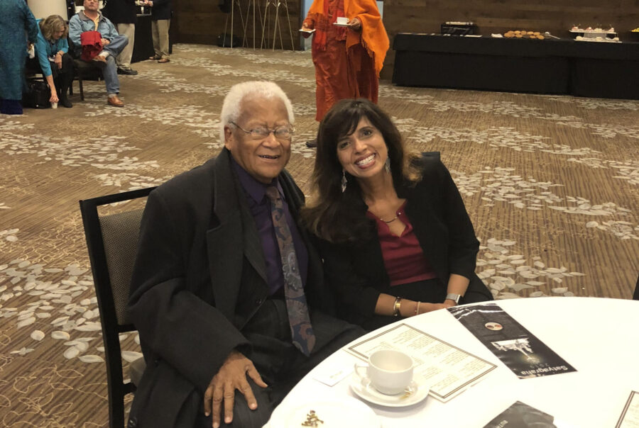 Dr. Lawson and Dr. Howard sitting together at a table